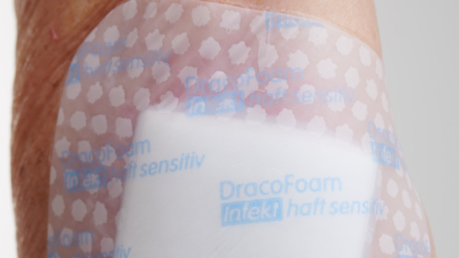 Silikonkleber mit Perforation, Detail bei Dracofoam haft infekt sensitiv