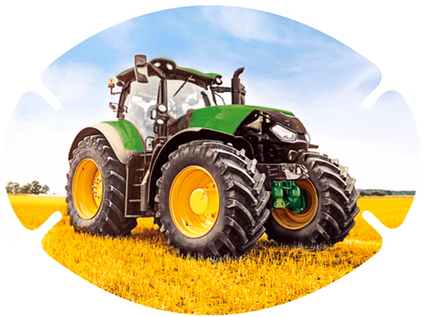 augenpflaster-motiv-trecker.png Grüner Traktor auf goldgelbem Feld bei blauem Himmel